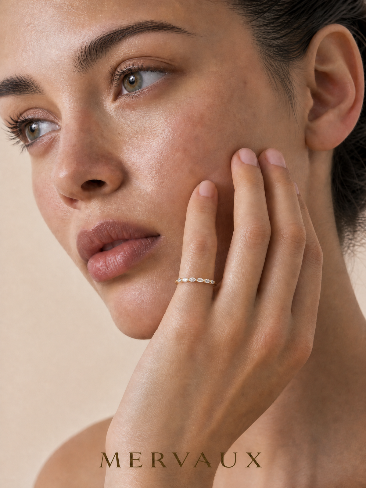 A close portrait in daylight, the scale at which everyday jewelry is actually seen.