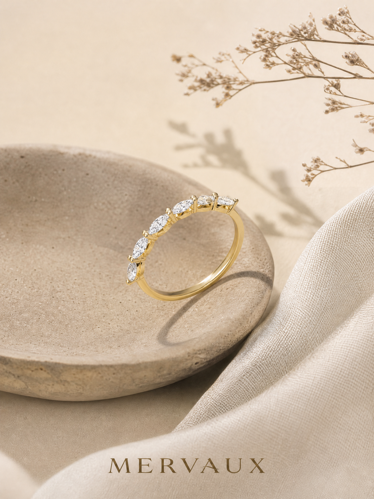 A gold diamond band photographed at rest, an object bought to be worn rather than held as a holding.