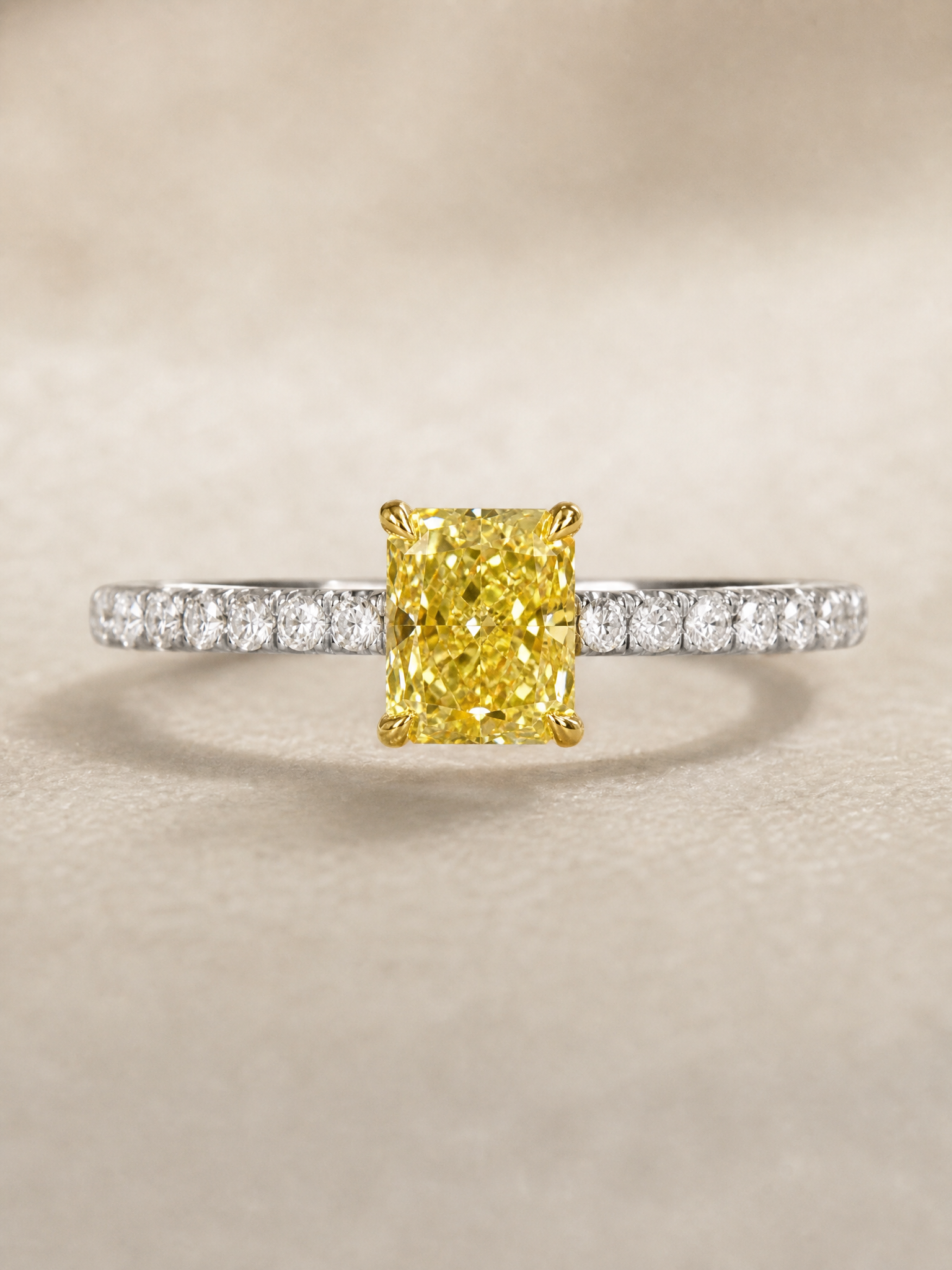 MERVAUX 0.5 ct fancy intense yellow radiant diamond ring in 18K two-tone gold - front view