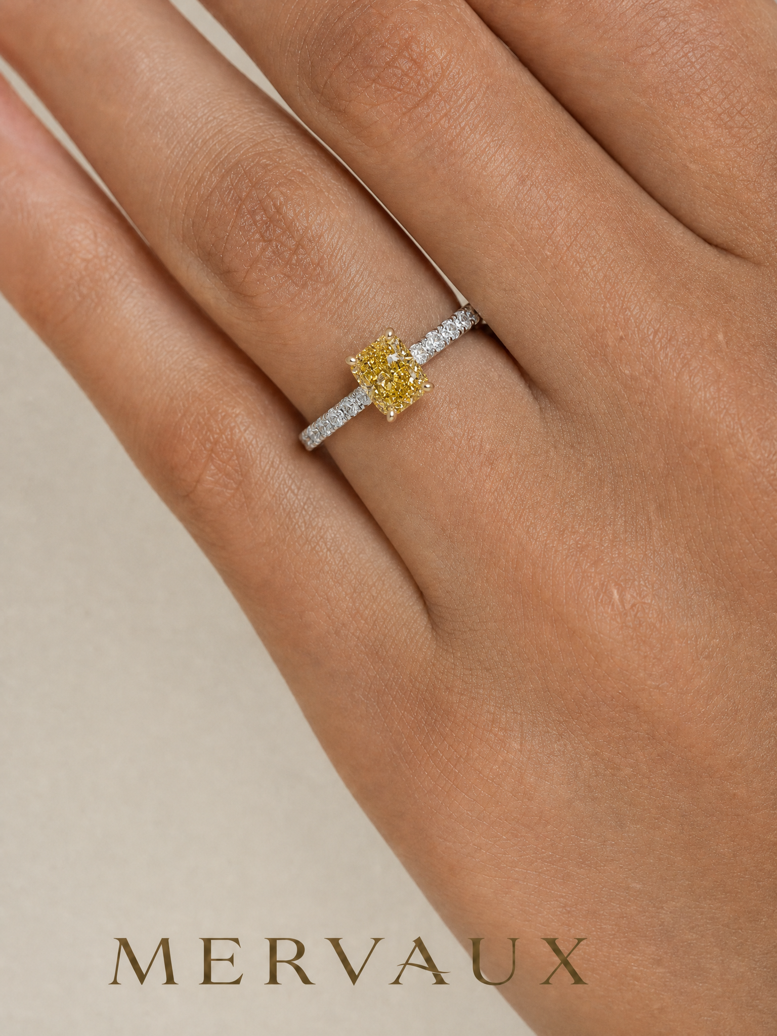 MERVAUX yellow diamond two-tone ring worn on hand, true to scale