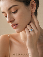 MERVAUX blue oval three-stone diamond ring, editorial lifestyle
