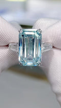 10.76 ct fancy blue emerald cut lab grown diamond ring with tapered baguette side stones in solid 18K gold
