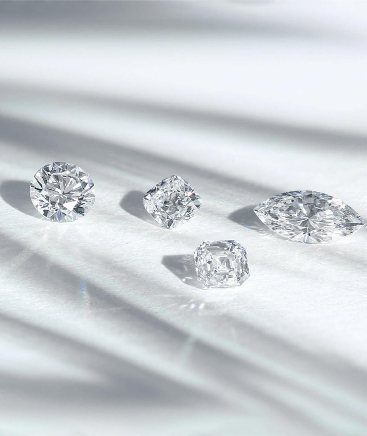 Loose diamonds in different cuts viewed in daylight